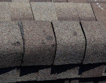Hail damage on roof in Norman